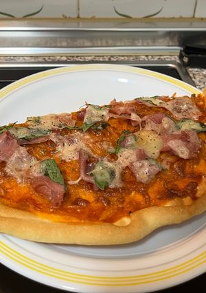 Una foto de Pizza de Jamón Ibérico y Rúcula