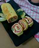 Omelette Roulade with vegetable and cornett beef 