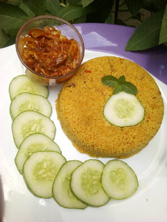 A picture of Fried couscous with cabbage sauce.