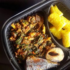 A picture of Boil plantain,fried fish and vegetable sauce.