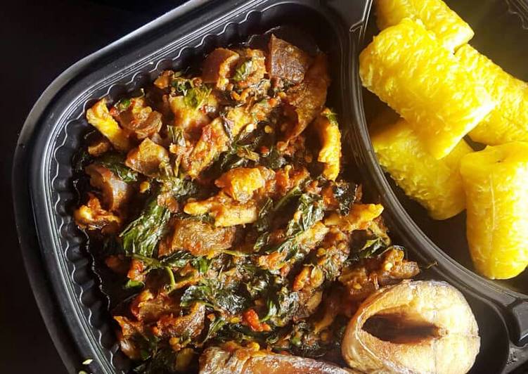Boil plantain,fried fish and vegetable sauce