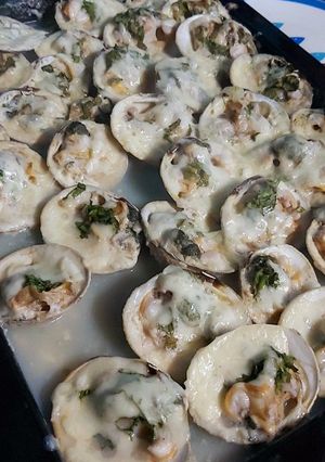 Una foto de Almejas A La Parmesana