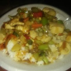 A picture of Chicken Stir Fry Over Rice.