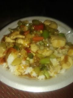 A picture of Chicken Stir Fry Over Rice.