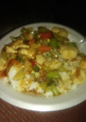 A picture of Chicken Stir Fry Over Rice.