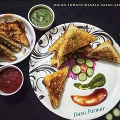 Onion Tomato Masala Papad Sandwich A picture of Onion Tomato Masala Papad Sandwich.