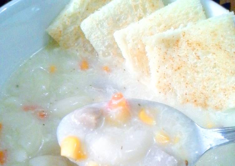 Creamy soup with toast bread