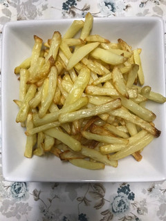 Una foto de Papas “fritas” en la air fryer