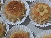 A picture of roasted peanuts and almonds