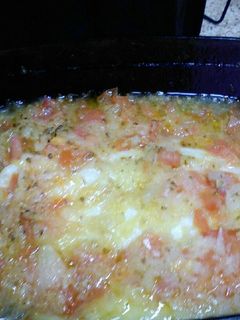 Una foto de Filetes de lenguado entomatados con gulas 
