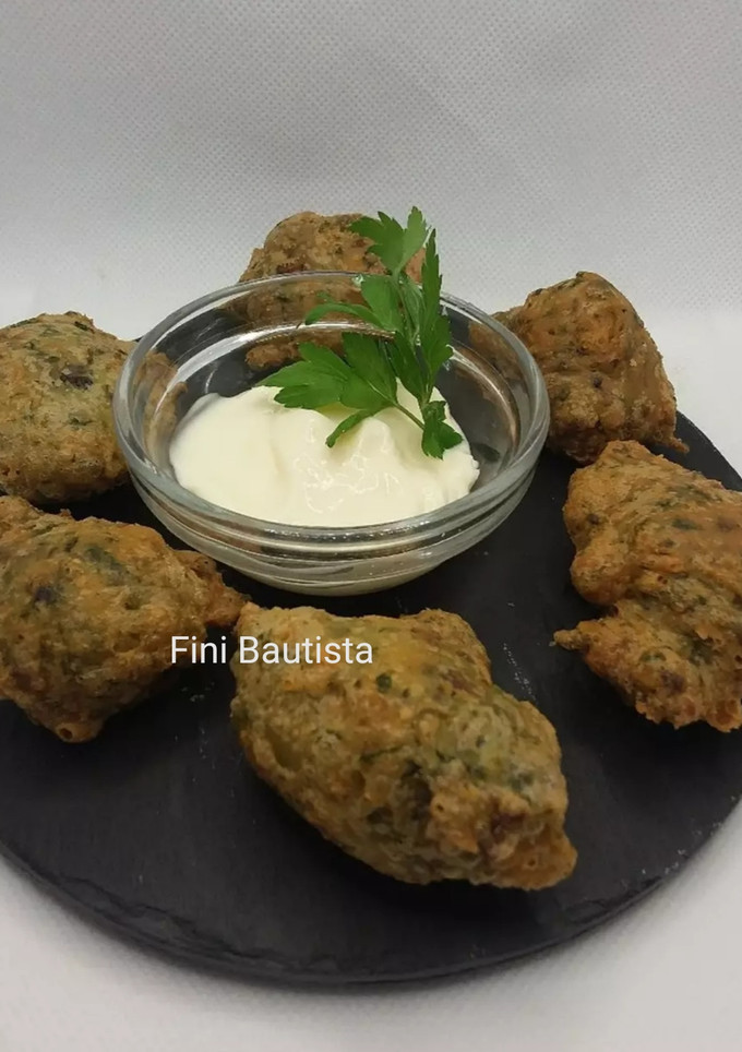 Una foto de Buñuelos de setas espinacas y gambas