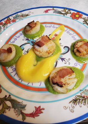 A picture of Brad's Sea Scallop Appetizer with Maple Butternut and Pea Puree.