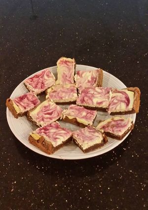 A picture of Blackberry Swirl Cheesecake Brownies.