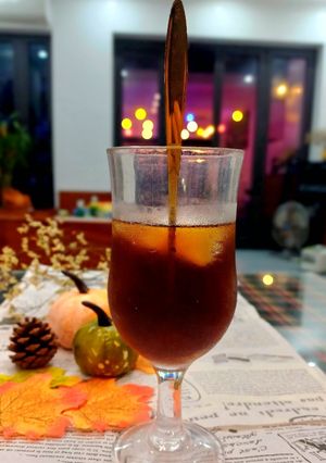Hình của món Trà ô long và mứt vỏ bưởi.