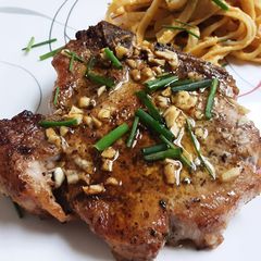 A picture of Oven Baked Bone-In Pork Chops.
