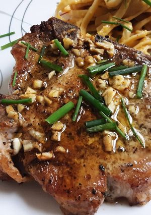 A picture of Oven Baked Bone-In Pork Chops.