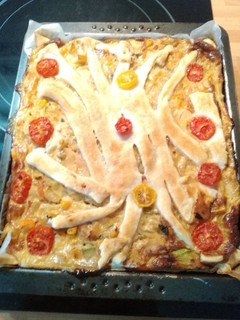 Una foto de Pastel tipo quiche de calabacín y pescado