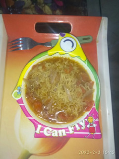 A picture of Maggi with tomato onion.