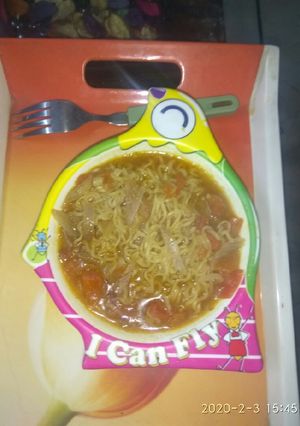 A picture of Maggi with tomato onion.