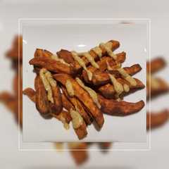 Una foto de Papitas de batata "frita" (air fried)