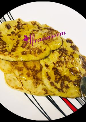 A picture of Oats pancakes with dash of cinnamon.
