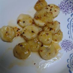 A picture of Spicy buttery fried bananas.