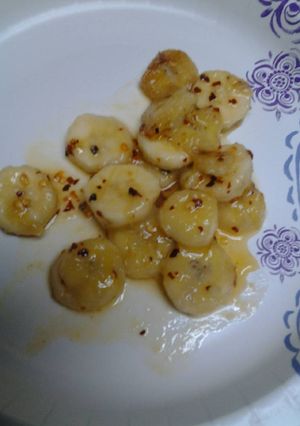 A picture of Spicy buttery fried bananas.