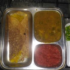 Masala Dosa with chutney A picture of Masala Dosa with chutney.
