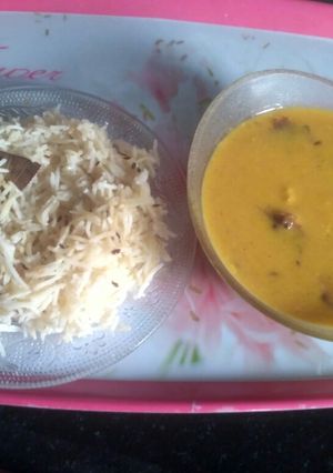 A picture of Punjabi curry pakoras with rice.