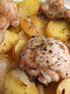 Una foto de Pollo al horno con oregano y limón