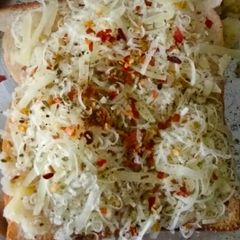 A picture of Bread cheese pizza.