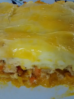 Una foto de Pastel de pollo, papas y zapallo 🍗🍴