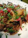 Salteado de res en mantequilla con papas