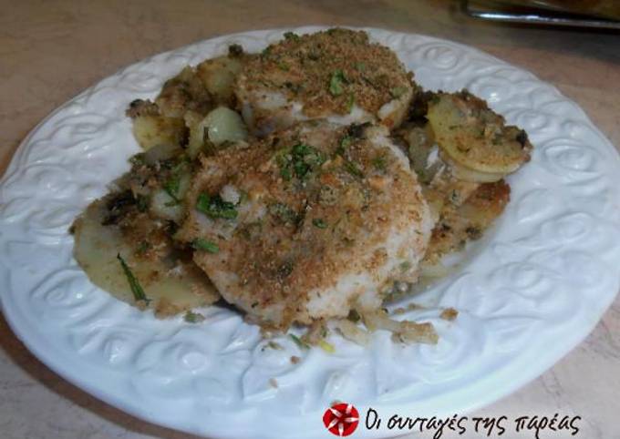 κύρια φωτογραφία συνταγής Μενταγιόν μπακαλιάρου στο φούρνο με πατάτες & αρωματικά