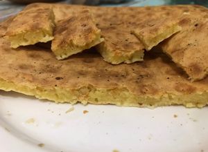 Una foto de Fainá con mucho Queso 🧀