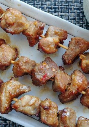 A picture of Pork satay skewers.