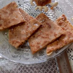 A picture of Stuffed jaggery cashew paratha.