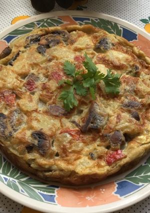 Una foto de Tortilla de papas y champiñones
