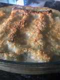 Canelones de espinacas, queso, jamón cocido, setas y piñones