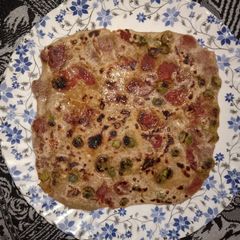 A picture of Potato carrot and peas Paratha.