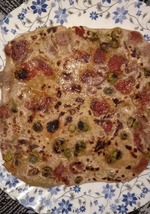 A picture of Potato carrot and peas Paratha.