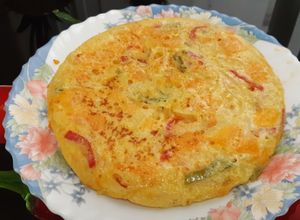 Foto principal de Tortilla de calabaza, cebolla y pimientos