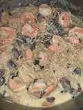 Shrimp and mushroom pasta with a basil white wine cream sauce