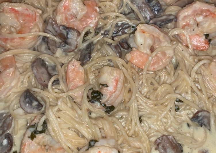 Shrimp and mushroom pasta with a basil white wine cream sauce