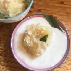 A picture of Cassava with coconut sauce - Vegan friendly.