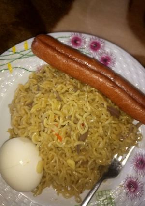 A picture of Indomie with egg & sausage.