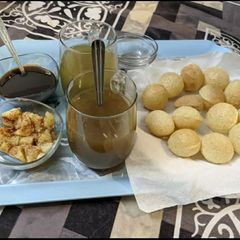 A picture of Golgappe with water.