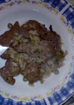Una foto de Hígado encebollado con arroz