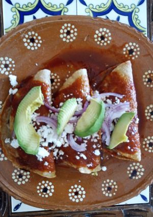 Una foto de Enchiladas de flor de calabaza y champiñones 🍄🍂🌶🌶