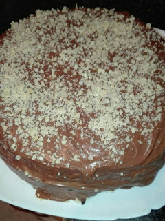 Una foto de Bizcocho de chocolate con crema de queso